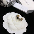 GUCCI 26S DOUBLE G LOGO BLACK CRYSTAL STUD EARRINGS IN ANTIQUE GOLD TONE METAL 627926