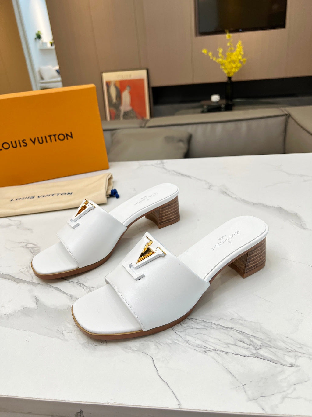 LV 26S CAPRI HIGH-HEELED MULES IN WHITE CALFSKIN