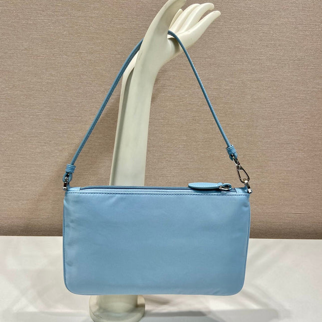 SHOULDER BAG 24 WITH TRIANGLE LOGO IN SKY BLUE RE-NYLON FABRIC