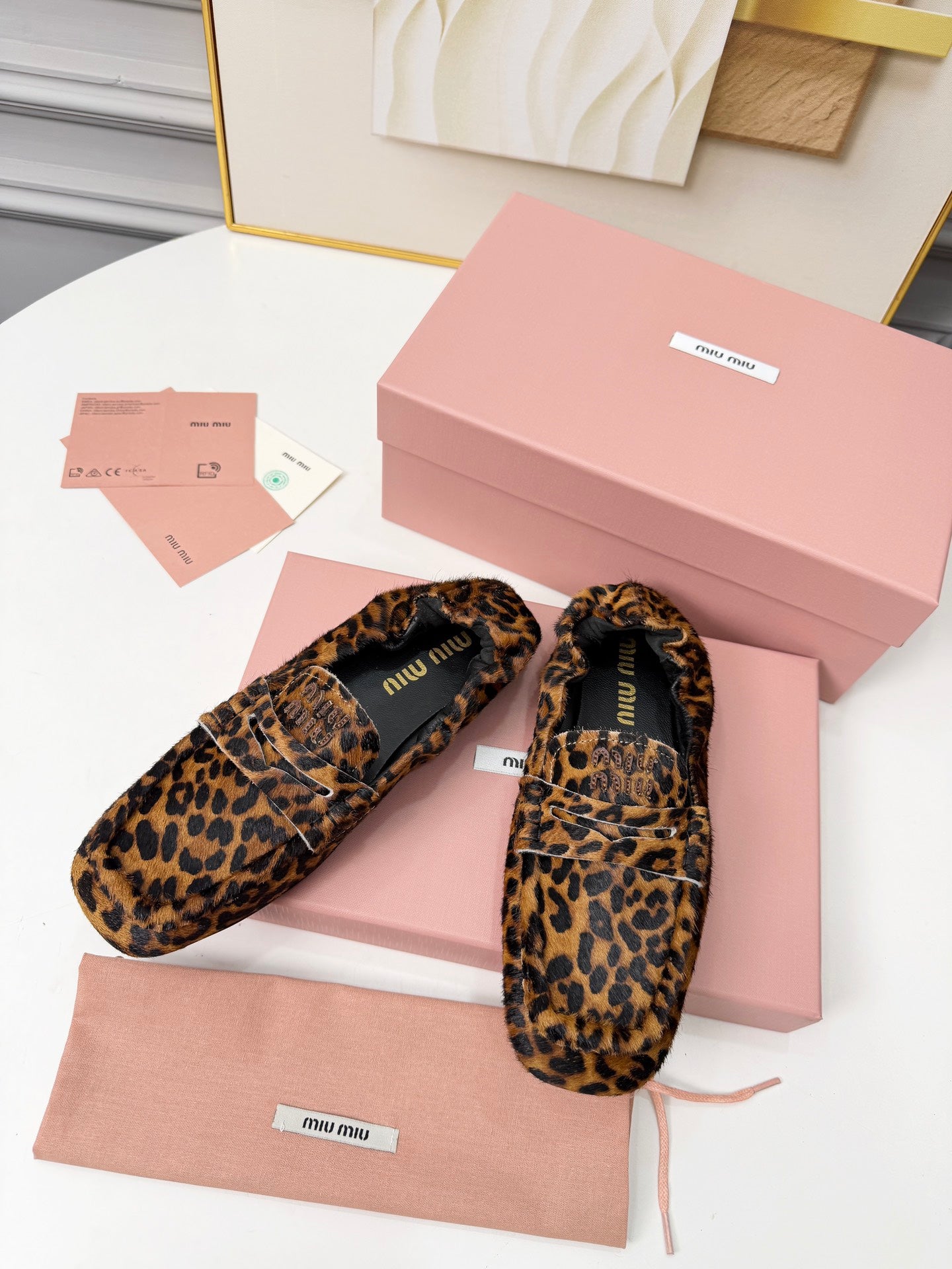 MIUMIU 26S RUCHES LOAFERS IN LEOPARD PRINT PONY HAIR