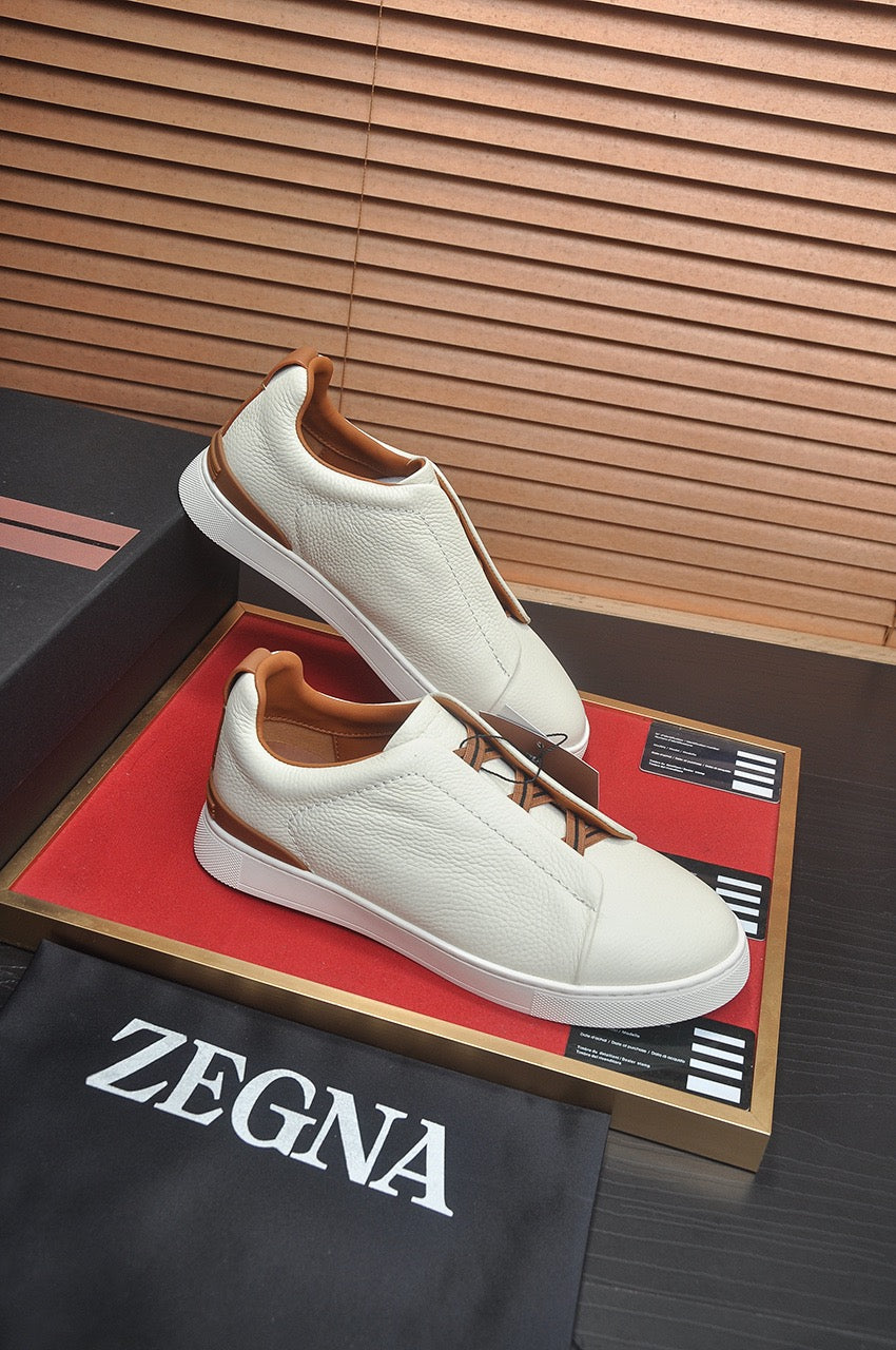 LOW-TOP SNEAKERS IN WHITE GRAINED CALFSKIN