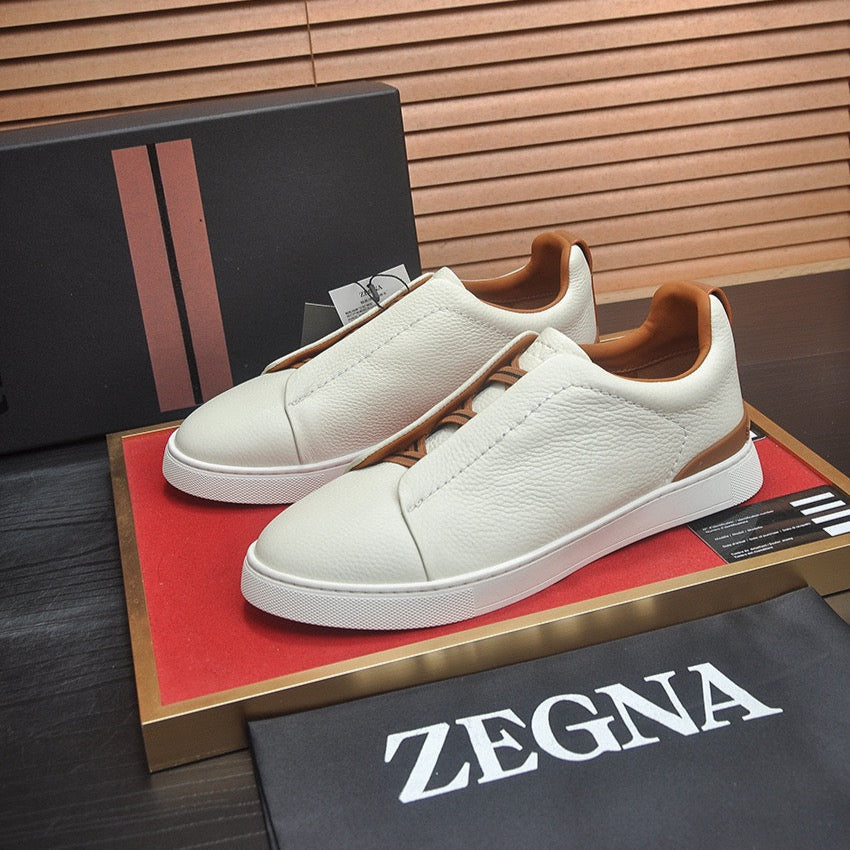 LOW-TOP SNEAKERS IN WHITE GRAINED CALFSKIN