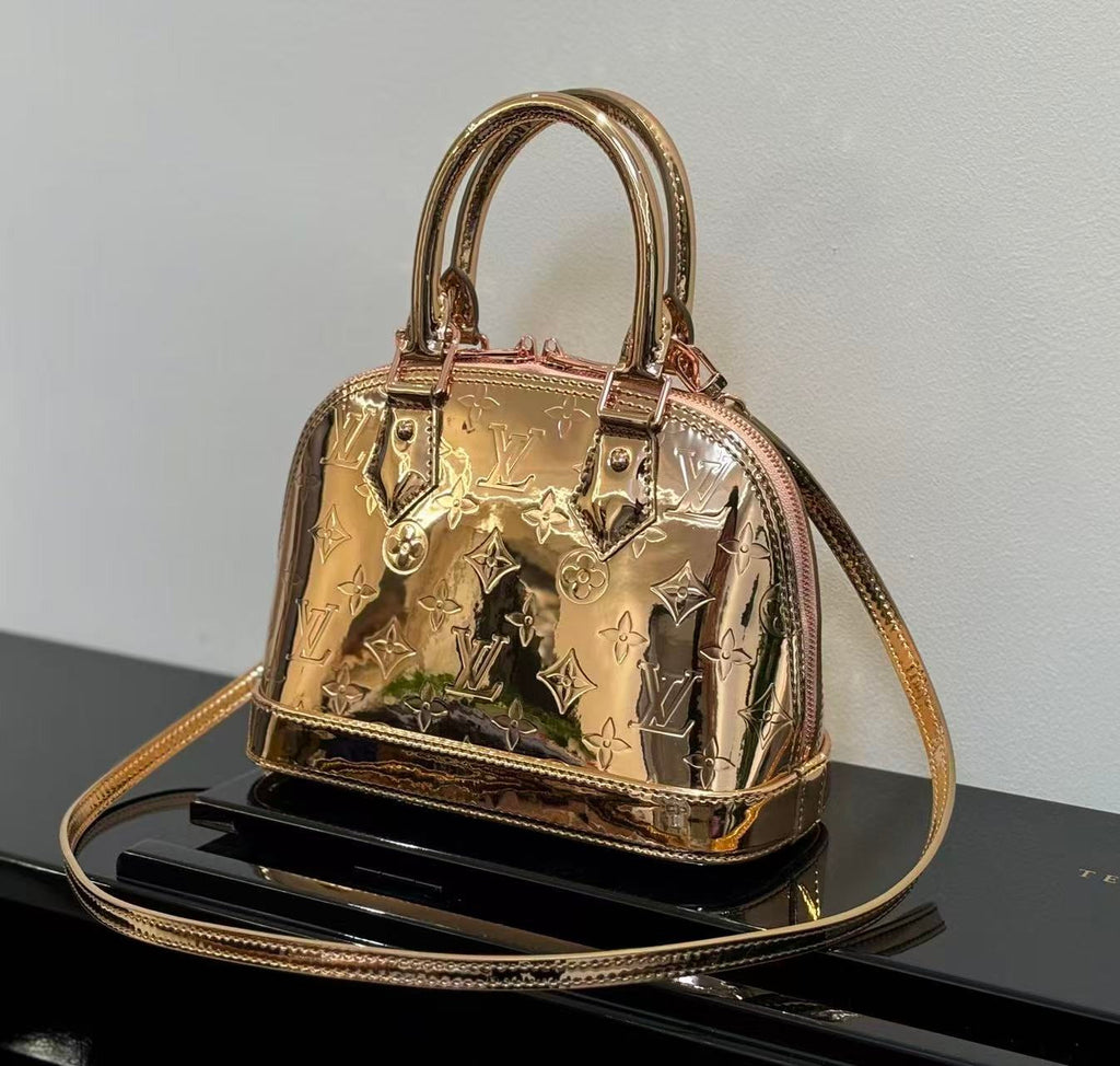 SPEEDY 23 IN GOLD MONOGRAM EMBOSSED CALFSKIN