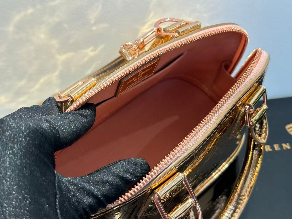 SPEEDY 23 IN GOLD MONOGRAM EMBOSSED CALFSKIN
