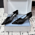 PRADA 26S POINTED-TOE HIGH HEELS 55MM IN BLACK PATENT CALFSKIN WITH BOW