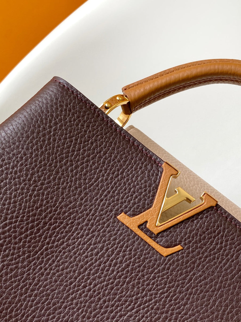 LV 26S CAPUCINES BAG 27 IN REDDISH BROWN TAURILLON CALFSKIN