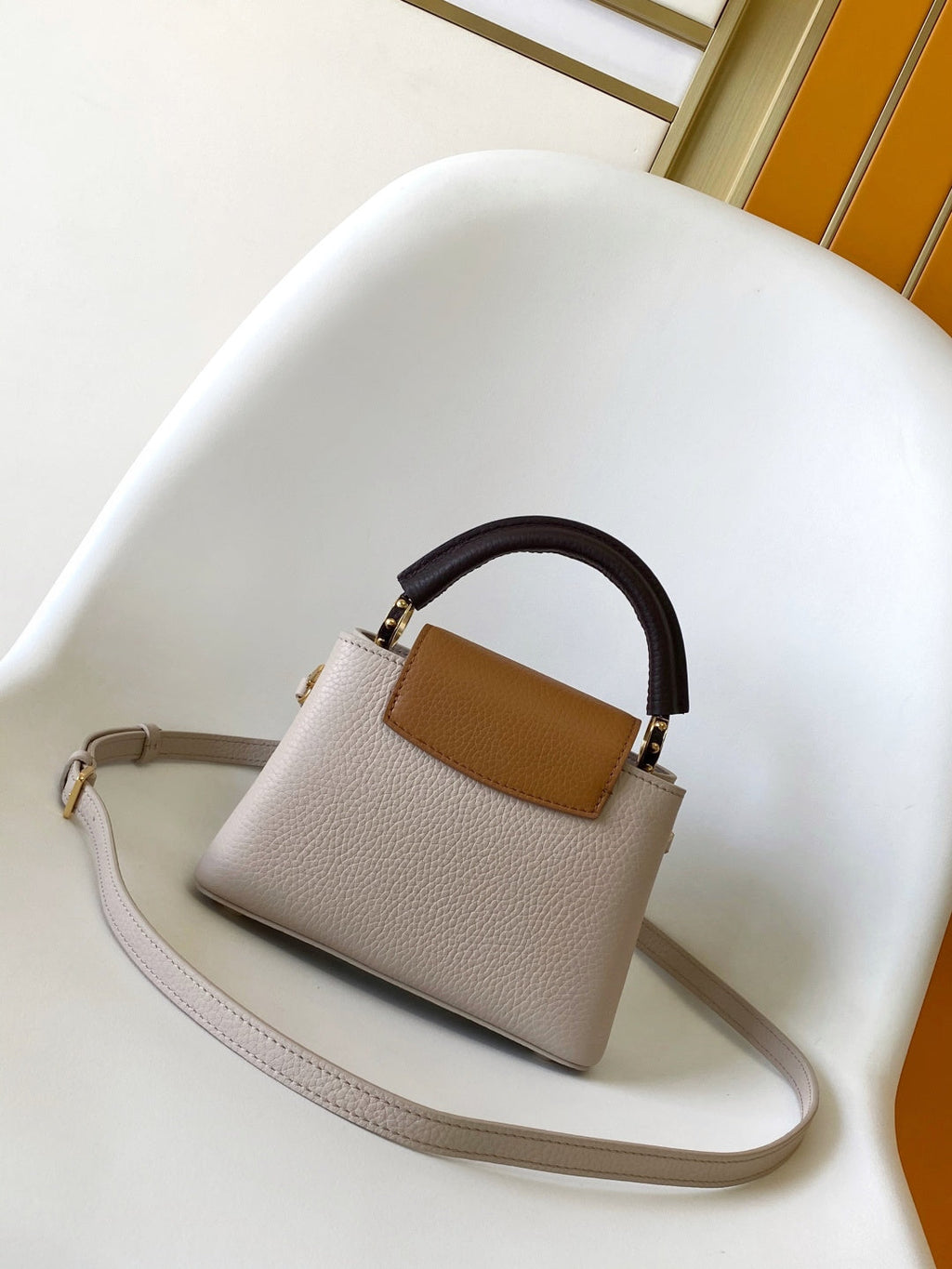 LV 26S CAPUCINES BAG 21 IN GRAYISH BEIGE TAURILLON CALFSKIN