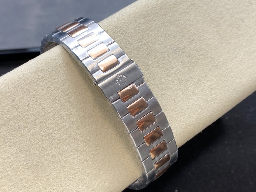 NAUTILUS STEEL AND ROSE GOLD BRACELET BLUE DIAL