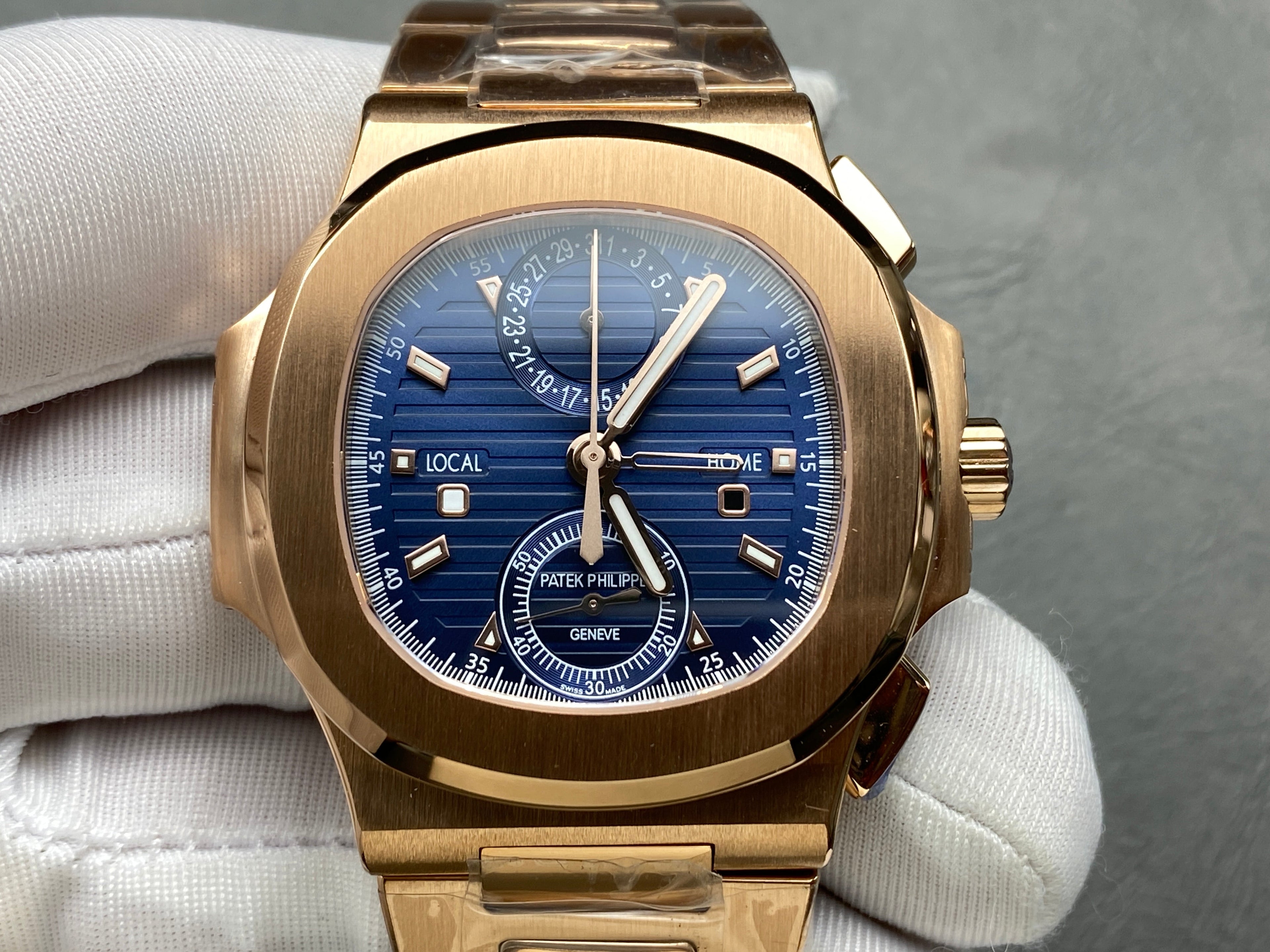 NAUTILUS TRAVEL TIME ROSE GOLD CASE SUNBURST BLUE DIAL