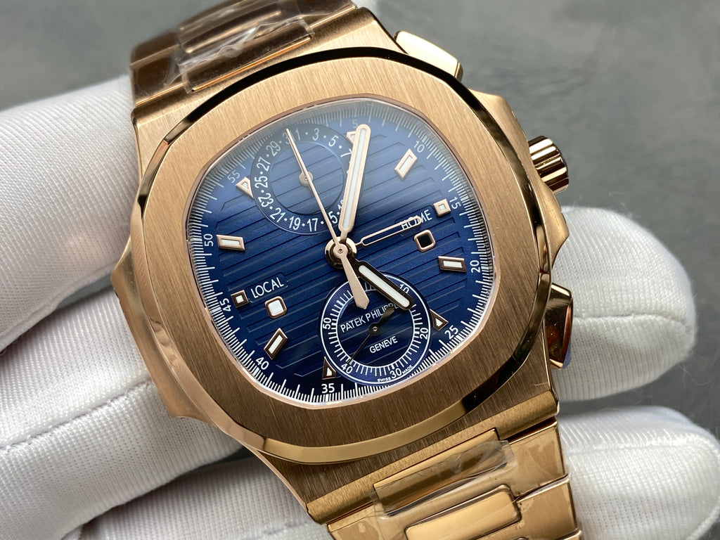 NAUTILUS TRAVEL TIME ROSE GOLD CASE SUNBURST BLUE DIAL