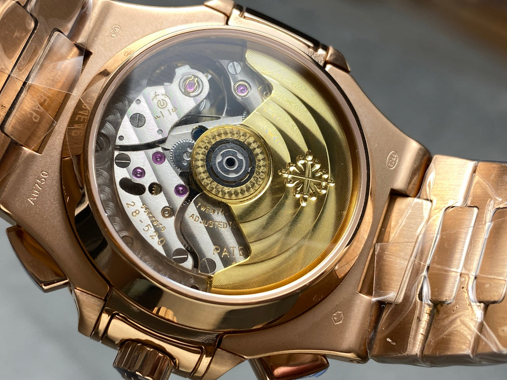 NAUTILUS TRAVEL TIME ROSE GOLD CASE SUNBURST BLUE DIAL
