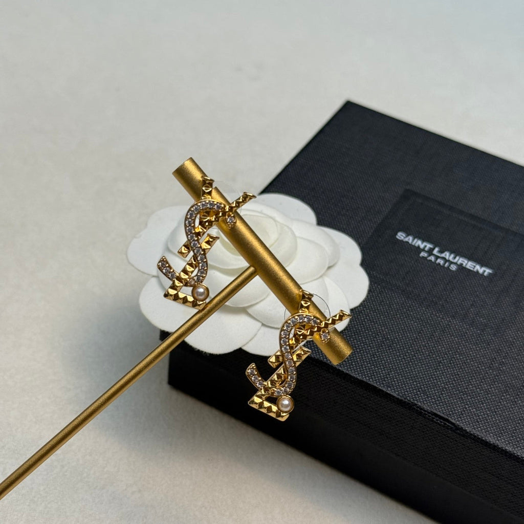 YSL 26S STUDDED CRYSTAL PEARL LOGO EARRINGS IN GOLD TONE METAL 629138
