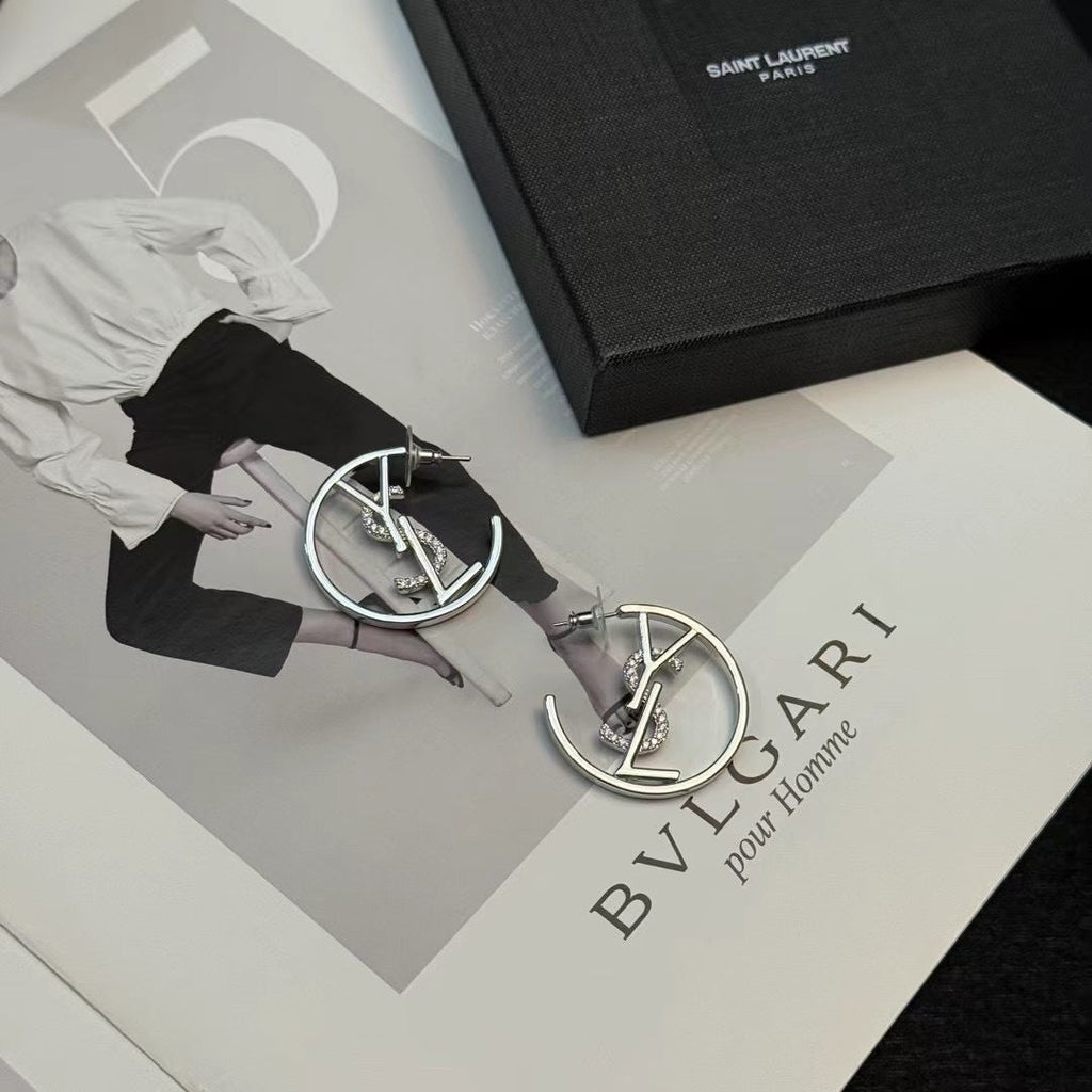 YSL 26S CRYSTAL LOGO HOOP EARRINGS IN SILVER TONE METAL 629137