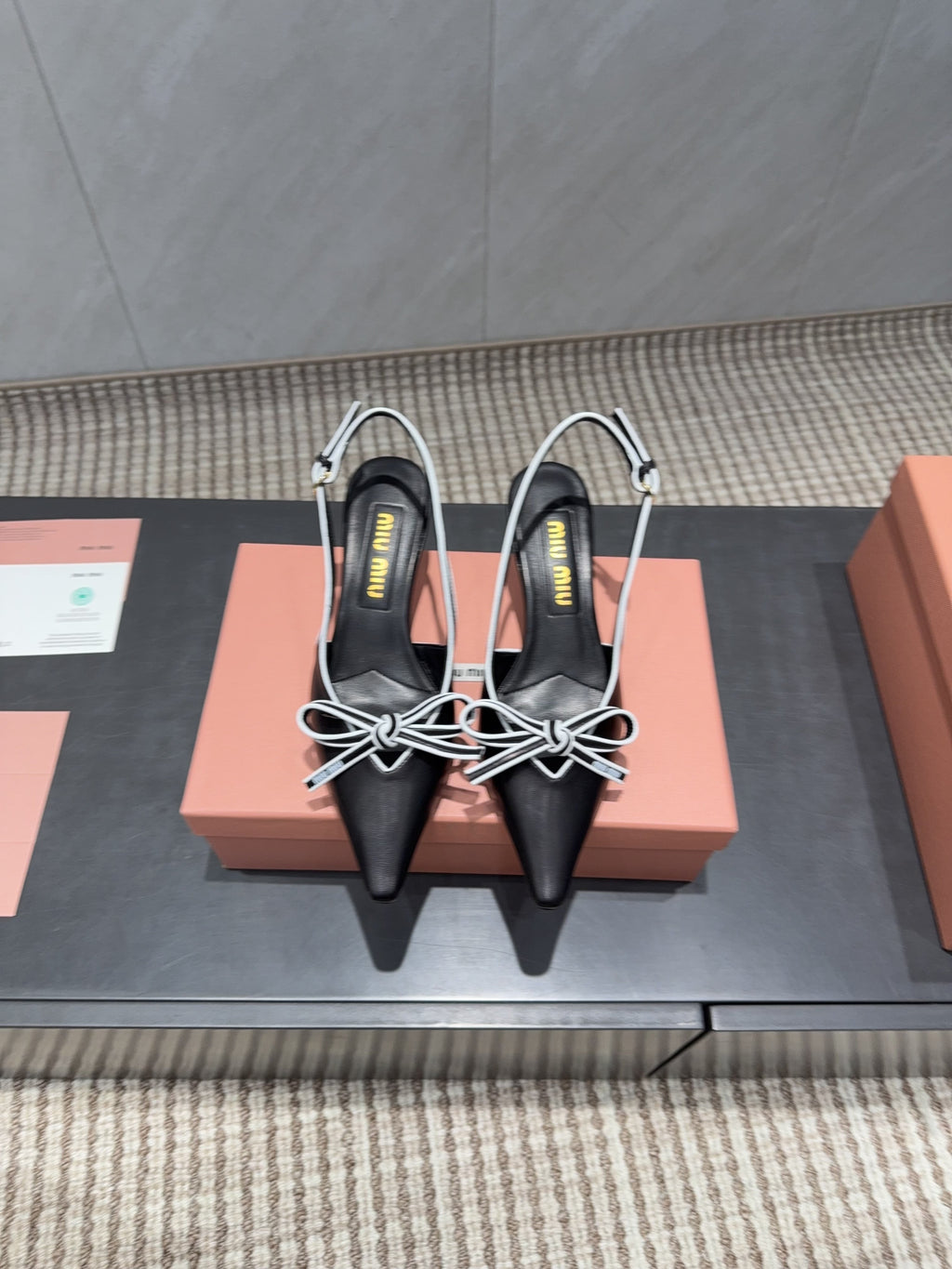 MIUMIU 26S SLINGBACK 55MM IN BLACK AND WHITE CALFSKIN WITH BOW