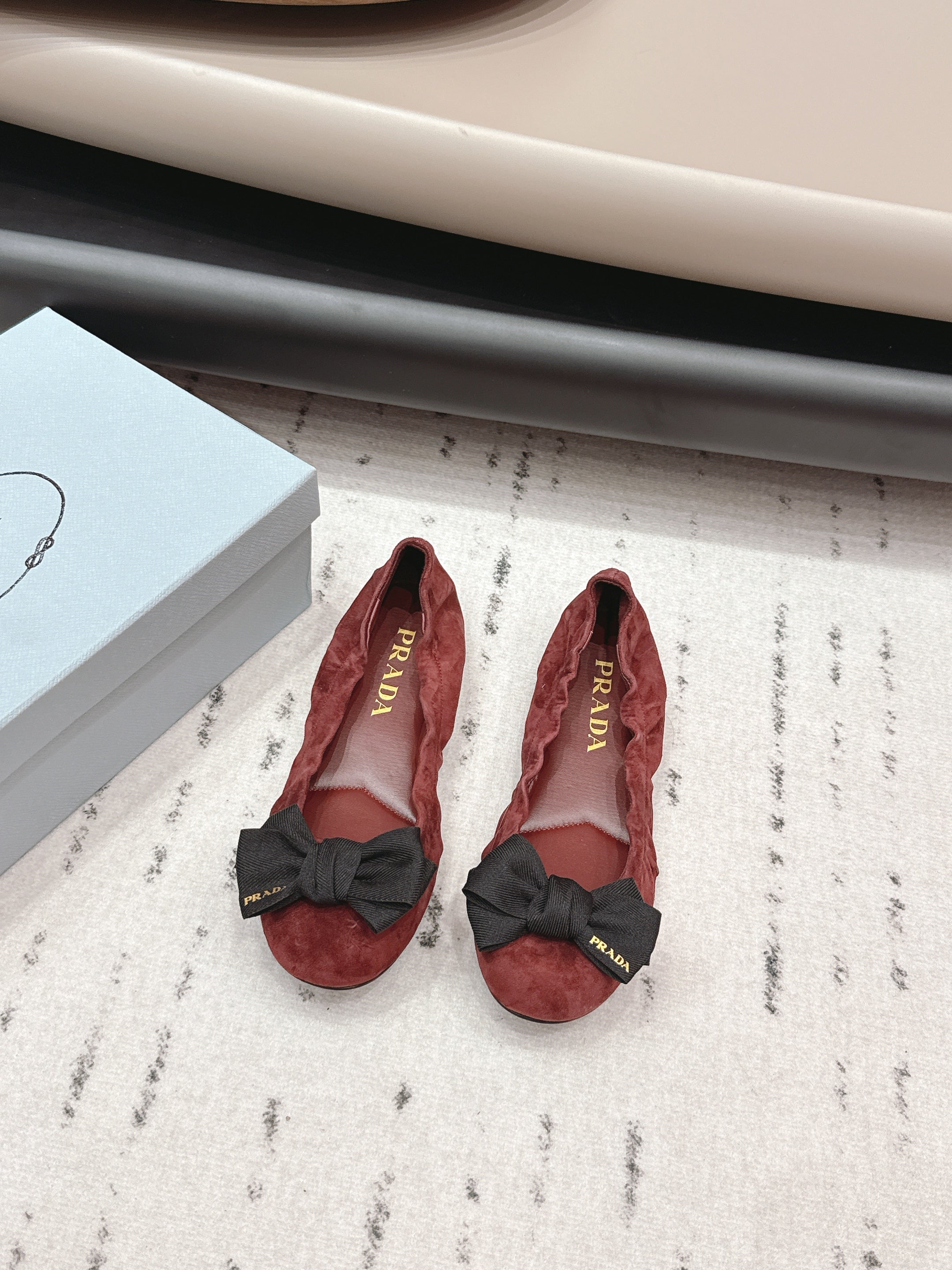 PRADA 26S ROUND TOE FLATS WITH BOW IN DARK RED SUEDE