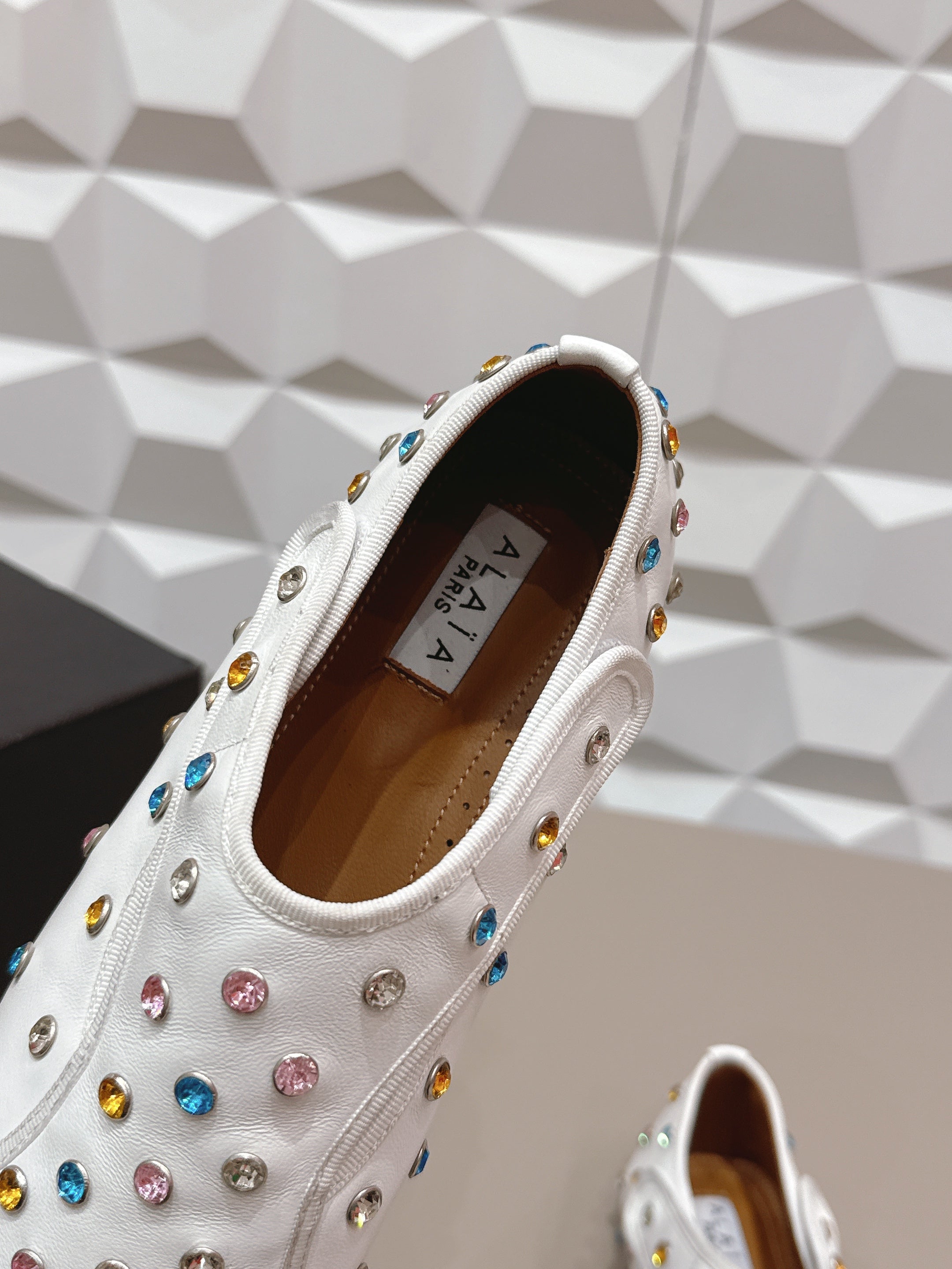 ALAIA 26S EMBELLISHED FLATS IN WHITE LAMBSKIN