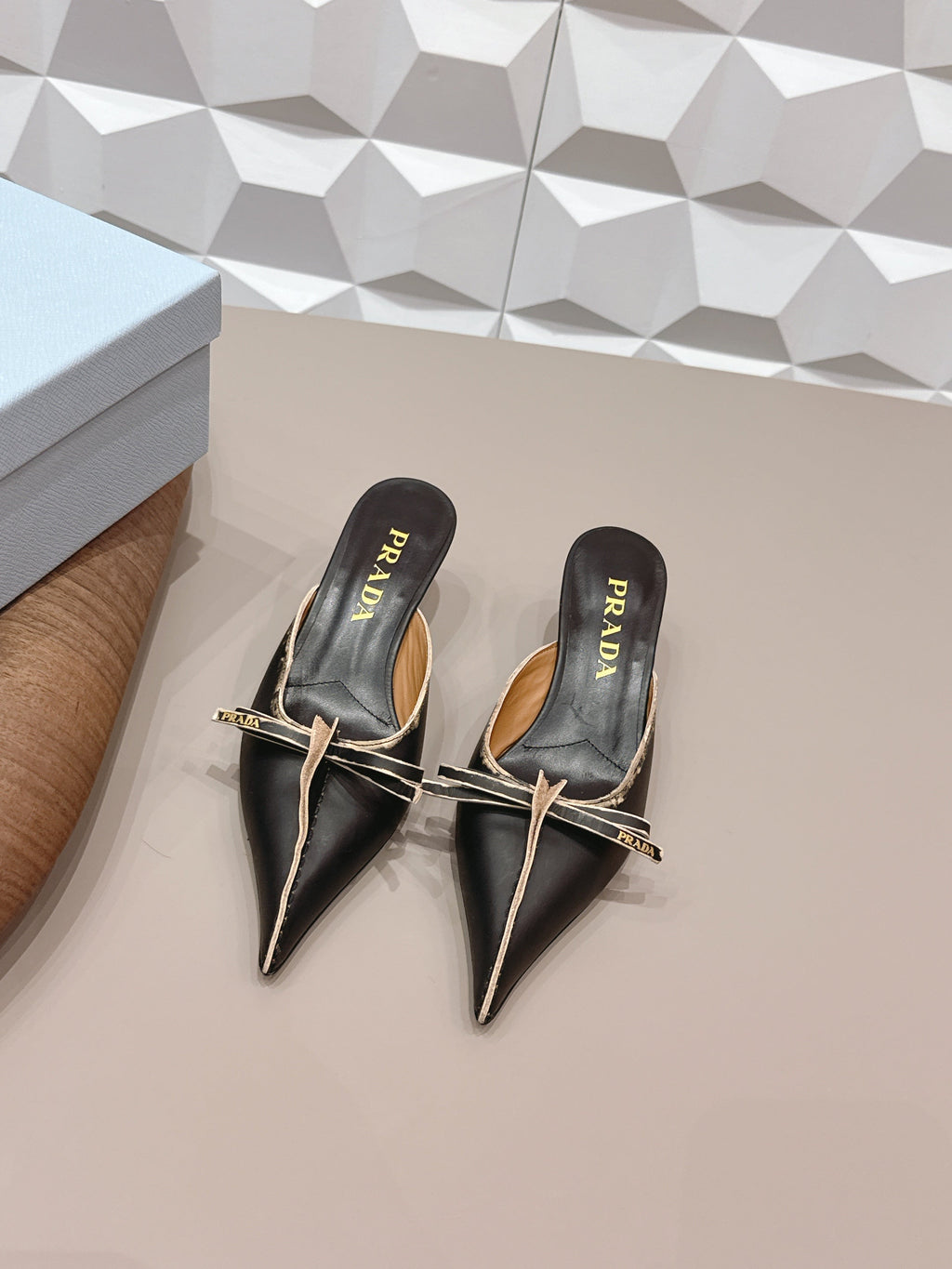 PRADA 26S POINTED TOE LACE TRIM MULES 55MM IN BLACK CALFSKIN WITH BOW