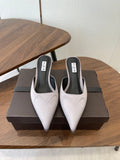 ALAIA 26S HEELED MULES 50 MM IN LAVENDER GREY FABRIC