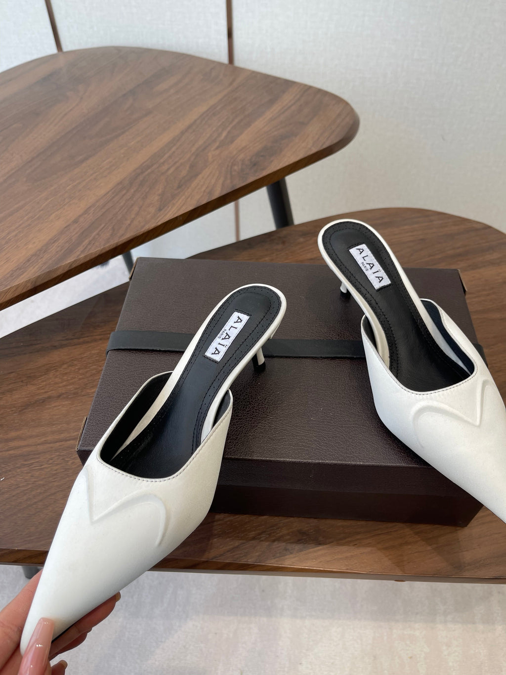 ALAIA 26S HEELED MULES 50 MM IN WHITE FABRIC