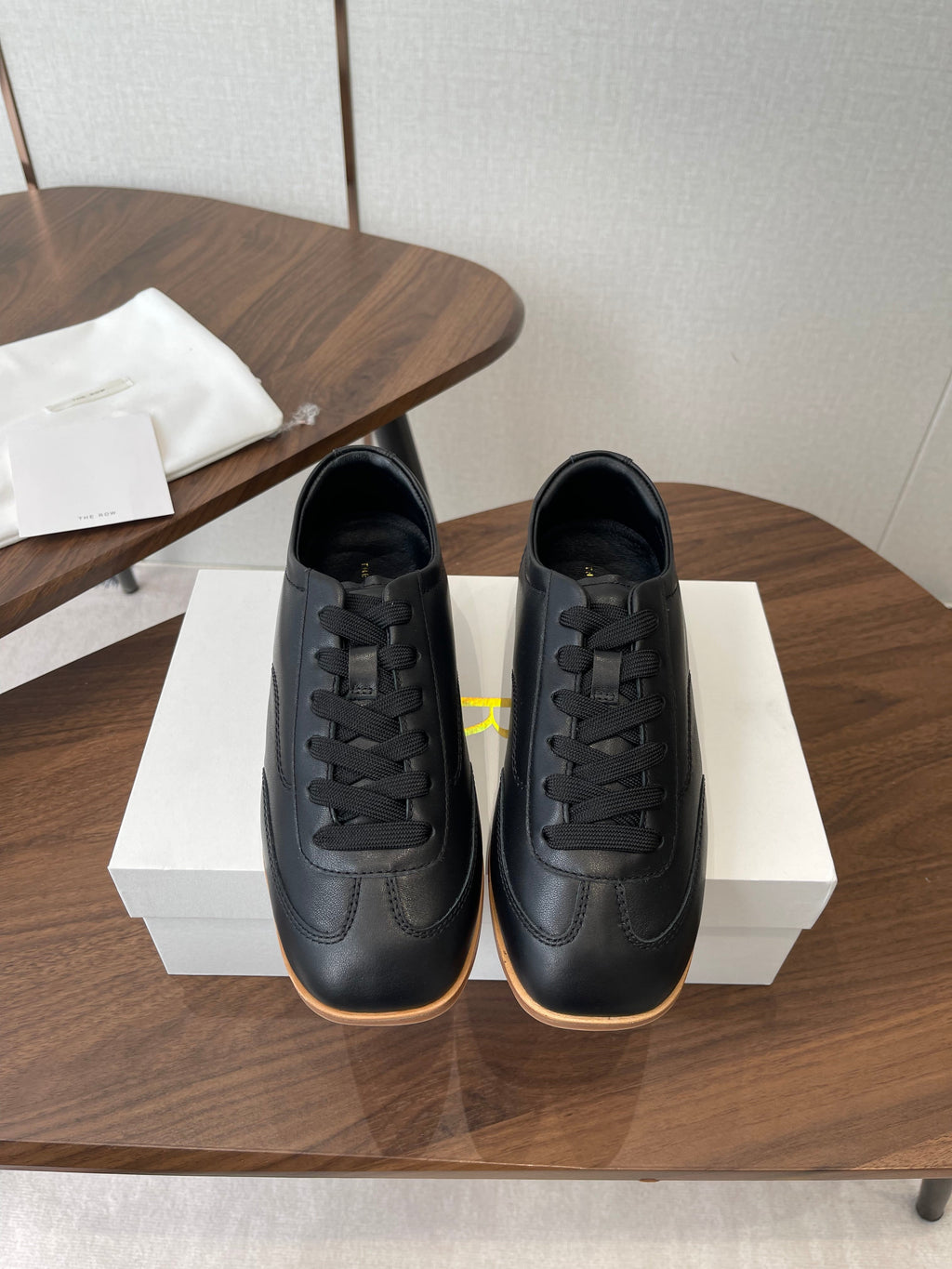 THE ROW 26S SNEAKERS IN BLACK CALFSKIN
