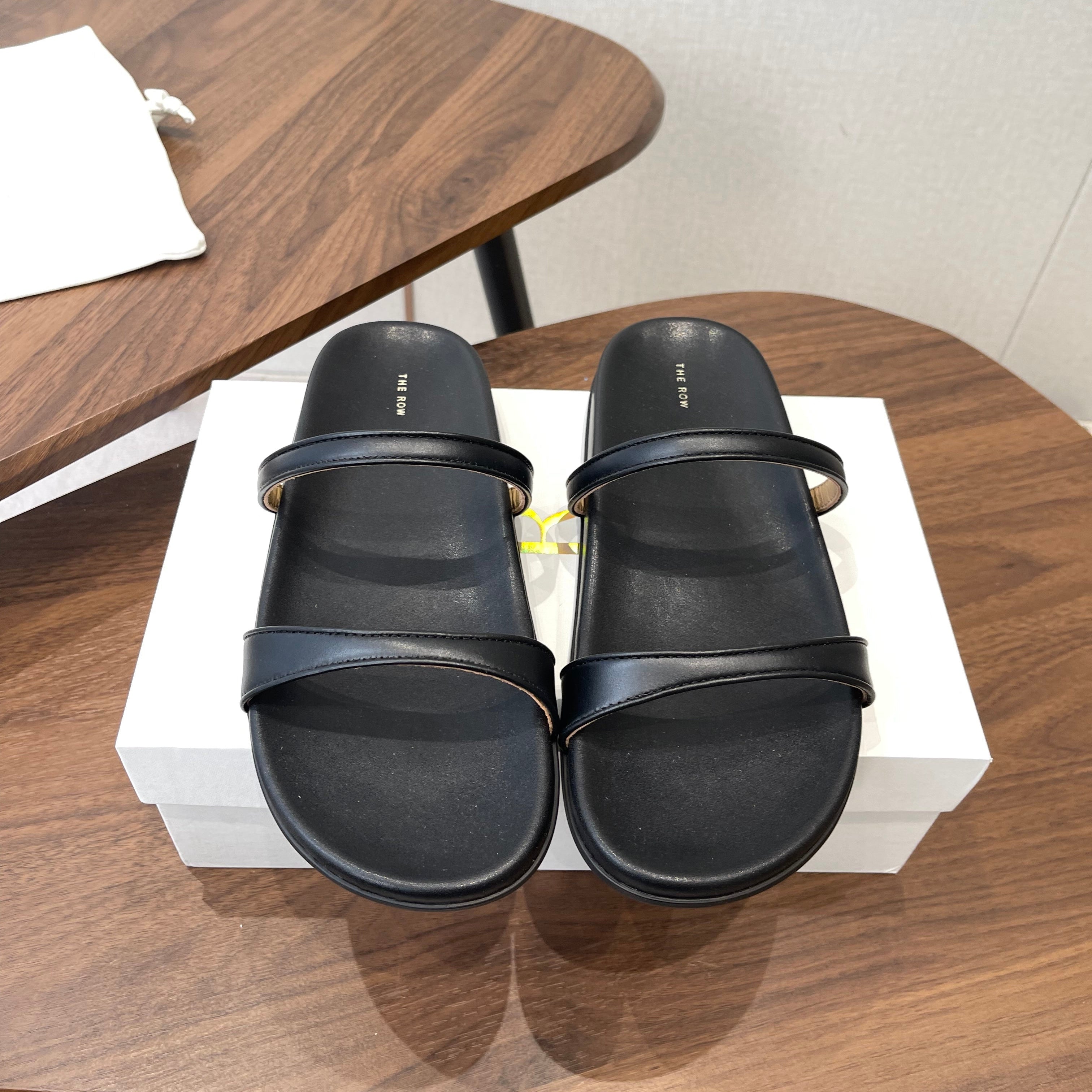 THE ROW 26S DOUBLE STRAP FLAT SANDALS IN BLACK CALFSKIN