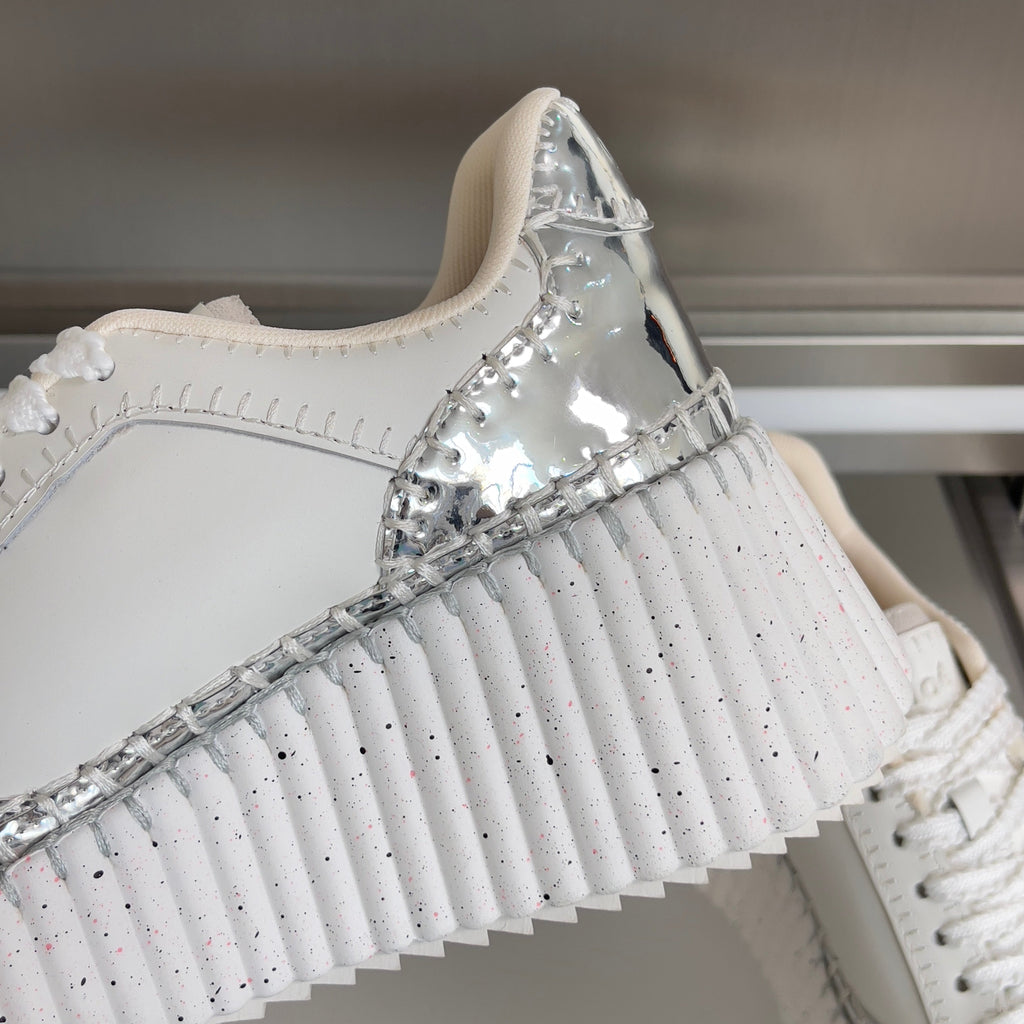 CHLOÉ 26S WEDGE SNEAKERS 70 MM IN WHITE AND SILVER CALFSKIN