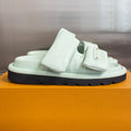LV 26S PADDED SLIDES 40MM IN MINT GREEN CALFSKIN MONOGRAM