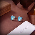 GUCCI 26S GG HEART ENAMEL STUD EARRINGS IN SILVER TONE METAL 624258