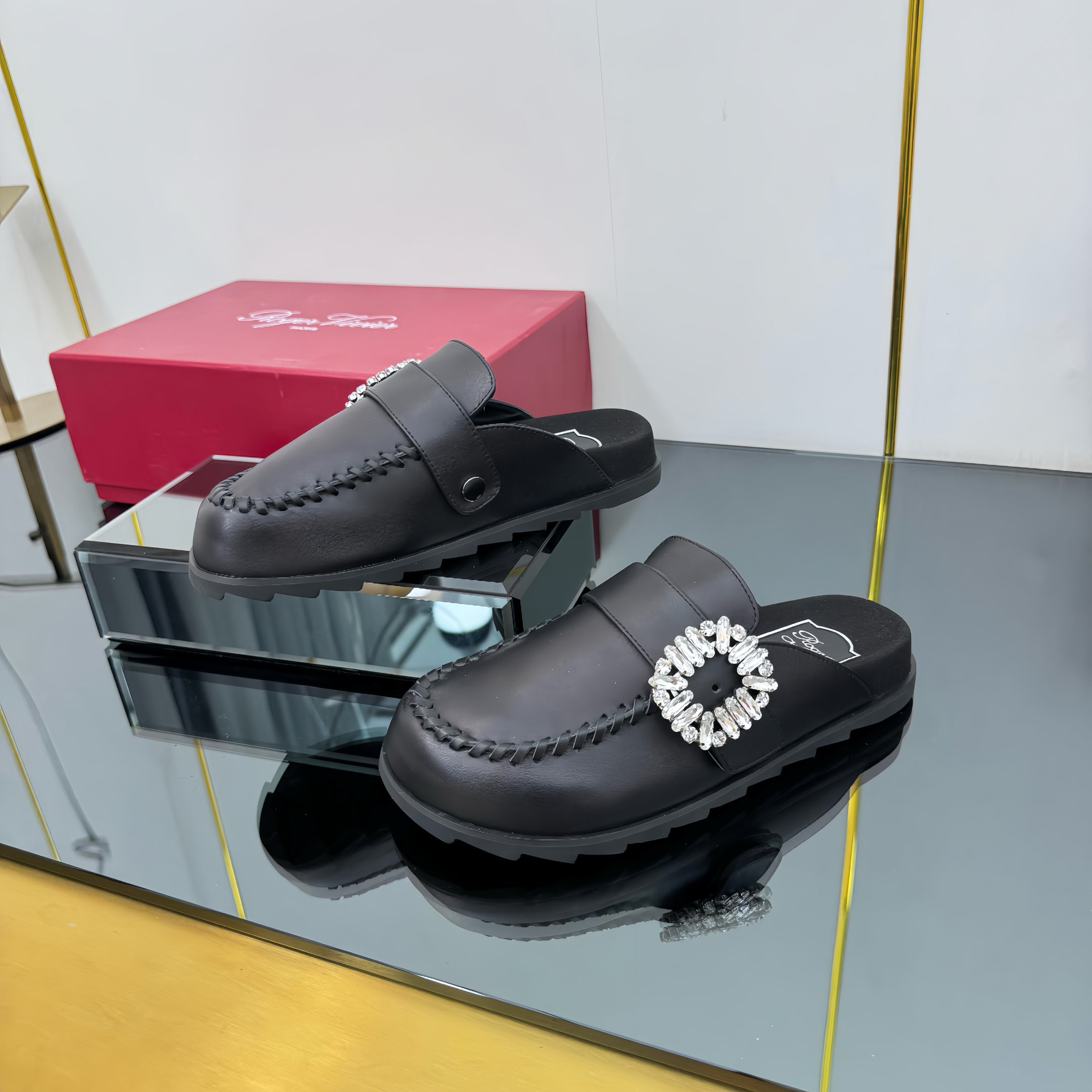 SLIDY VIV' MULES IN BLACK CALFSKIN