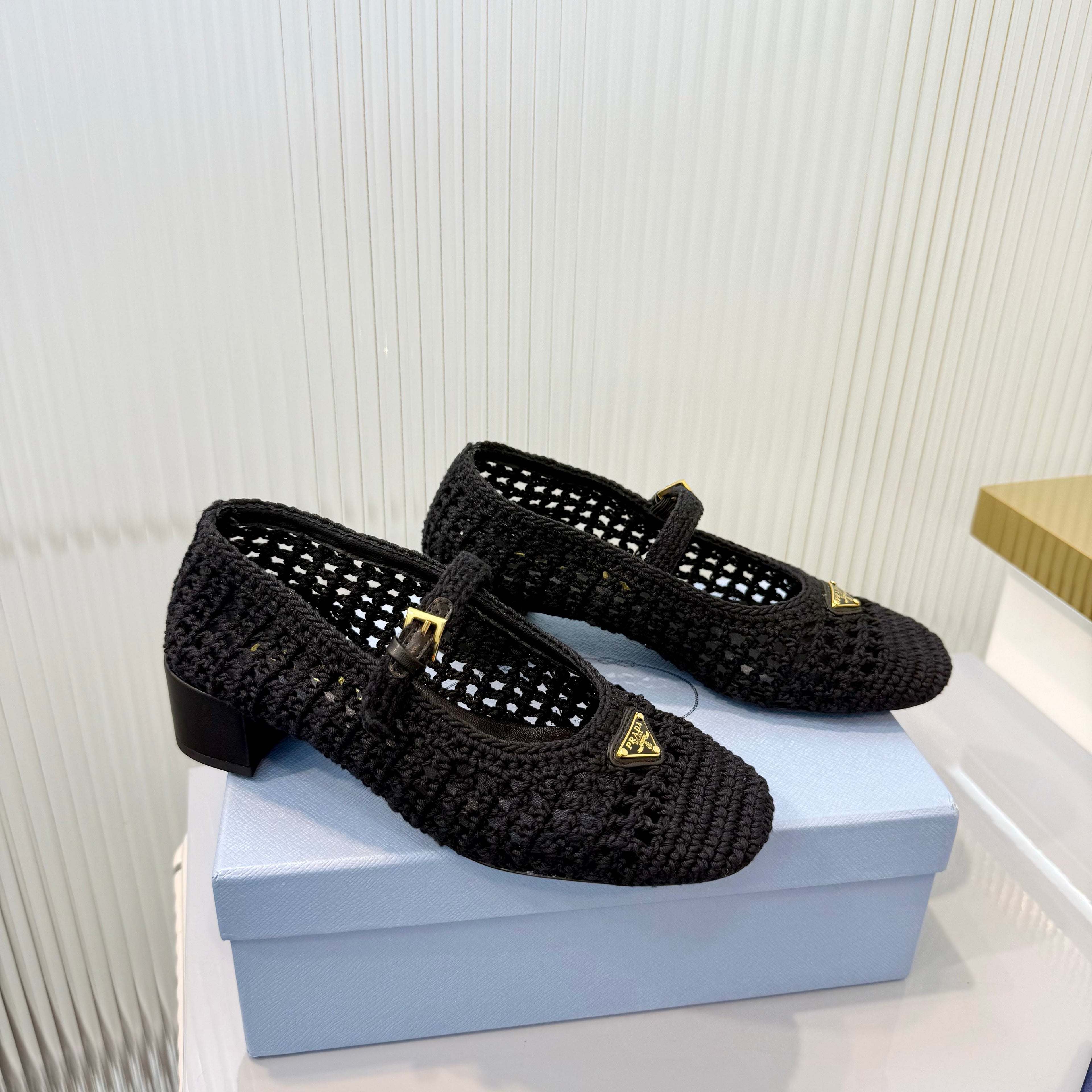 PRADA 26S LOGO PLAQUE CROCHET MARY JANE PUMPS 50MM IN BLACK WOVEN FIBER
