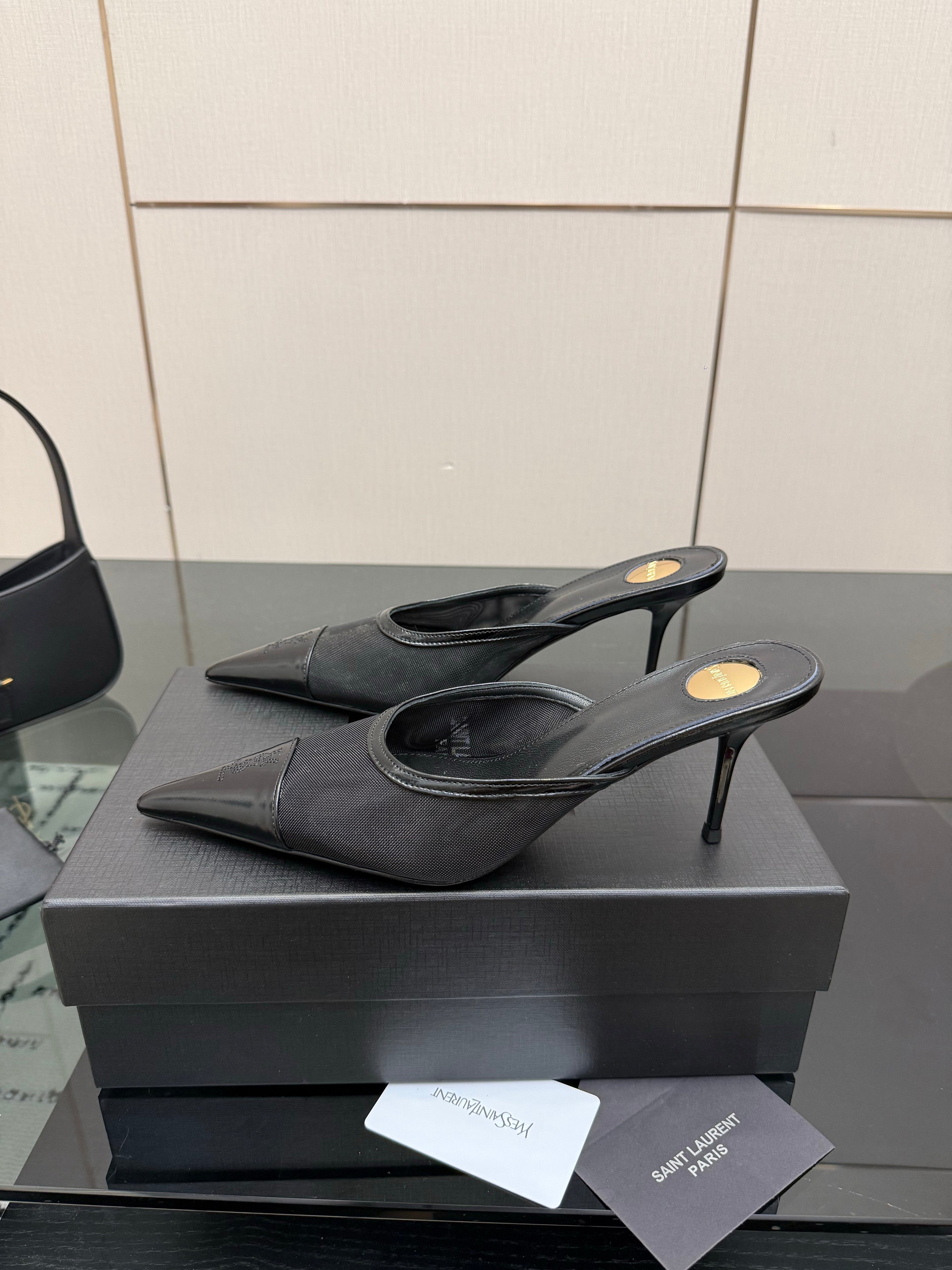 YSL 26S HIGH-HEEL MULES IN BLACK CALFSKIN AND MESH FABRIC
