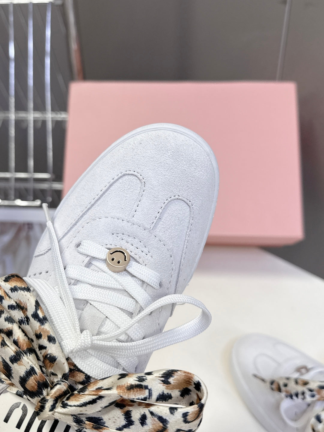 MIUMIU 25S SNEAKERS IN WHITE SUEDE WITH LEOPARD-PRINT LACES
