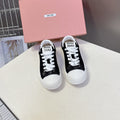 MIUMIU 25S SNEAKERS IN BLACK SUEDE