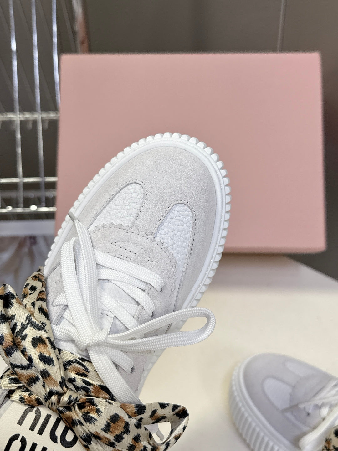 MIUMIU 25S SNEAKERS 45NN IN WHITE SUEDE WITH LEOPARD-PRINT LACES