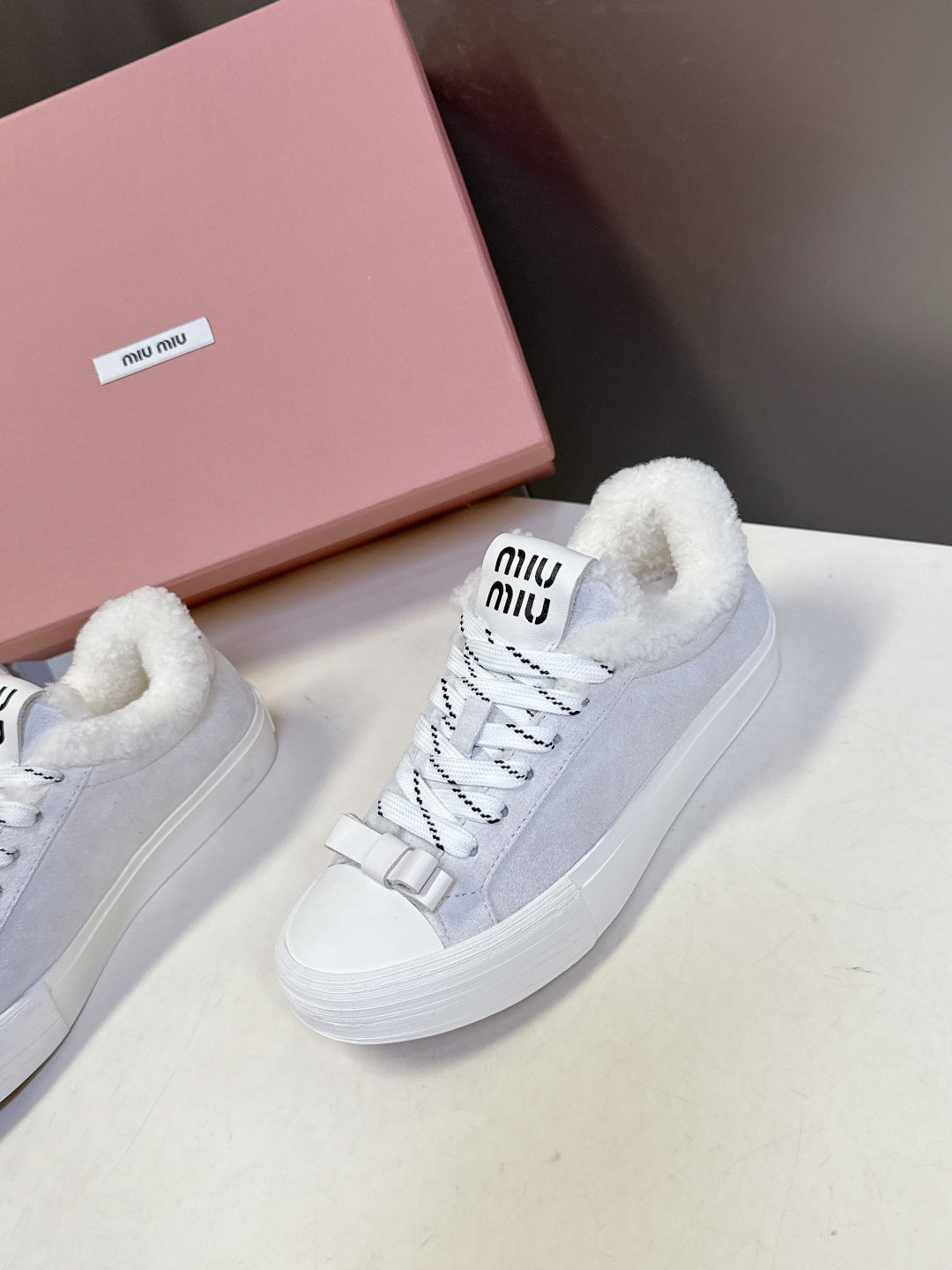 MIUMIU 25S SNEAKERS IN WHITE SUEDE WITH SHEARLING