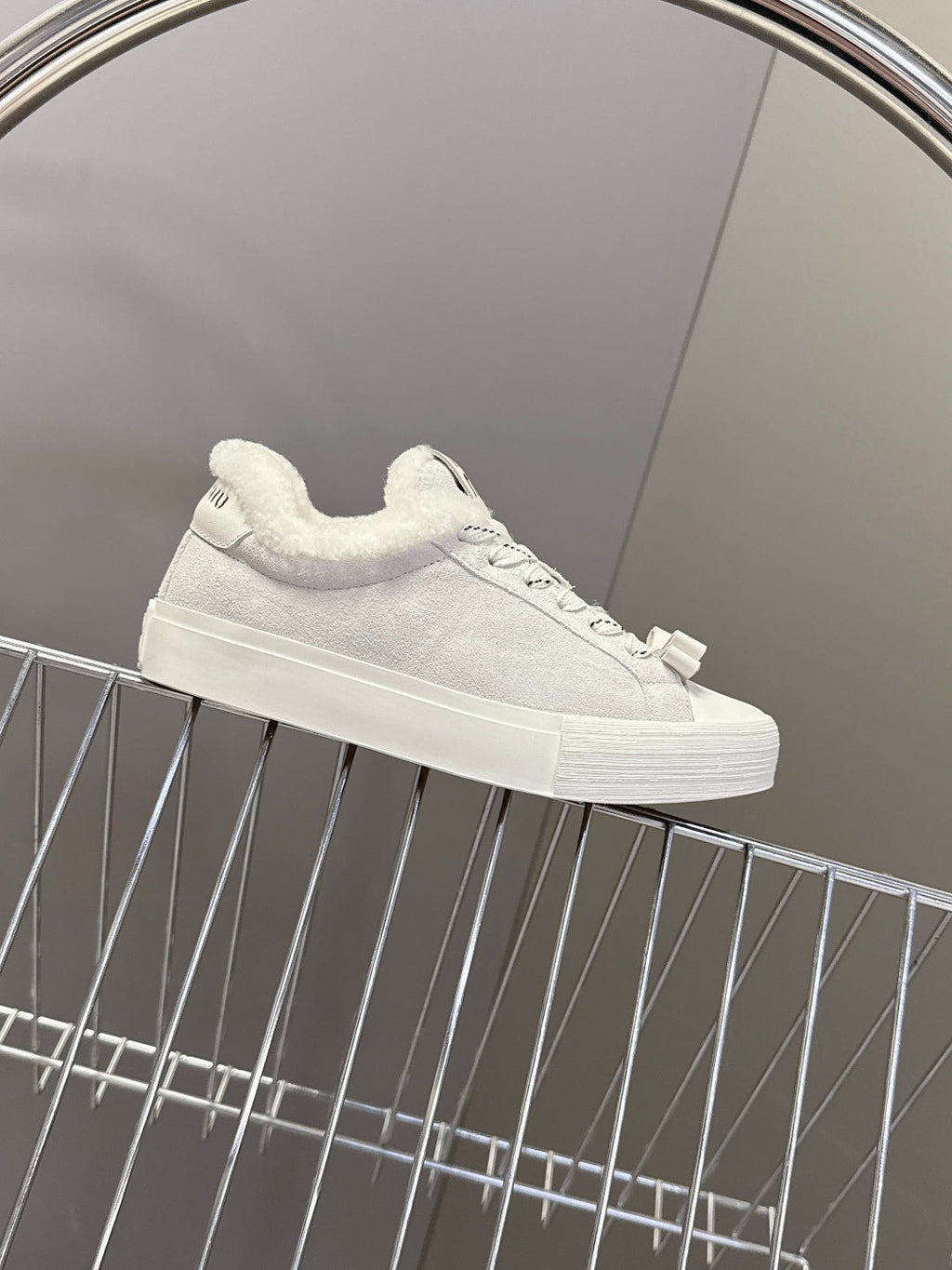 MIUMIU 25S SNEAKERS IN WHITE SUEDE WITH SHEARLING