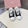 MIUMIU 25S SNEAKERS IN BLACK SUEDE WITH SHEARLING