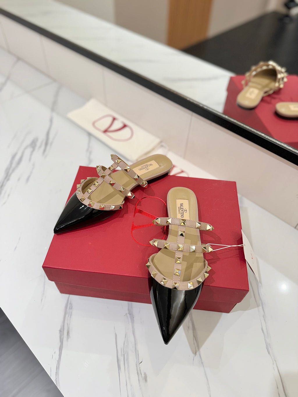 VALENTINO 26S STUDDED FLAT MULES IN BLACK PATENT CALFSKIN