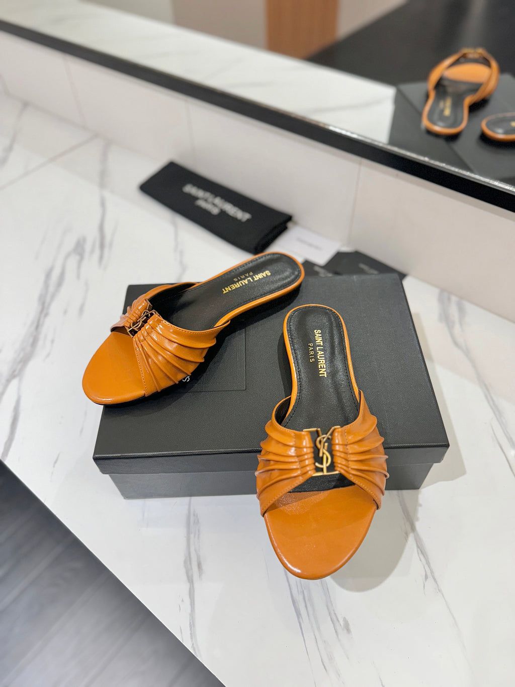 YSL 26S BABYLONE FLAT MULES IN DARK ORANGE LAMBSKIN