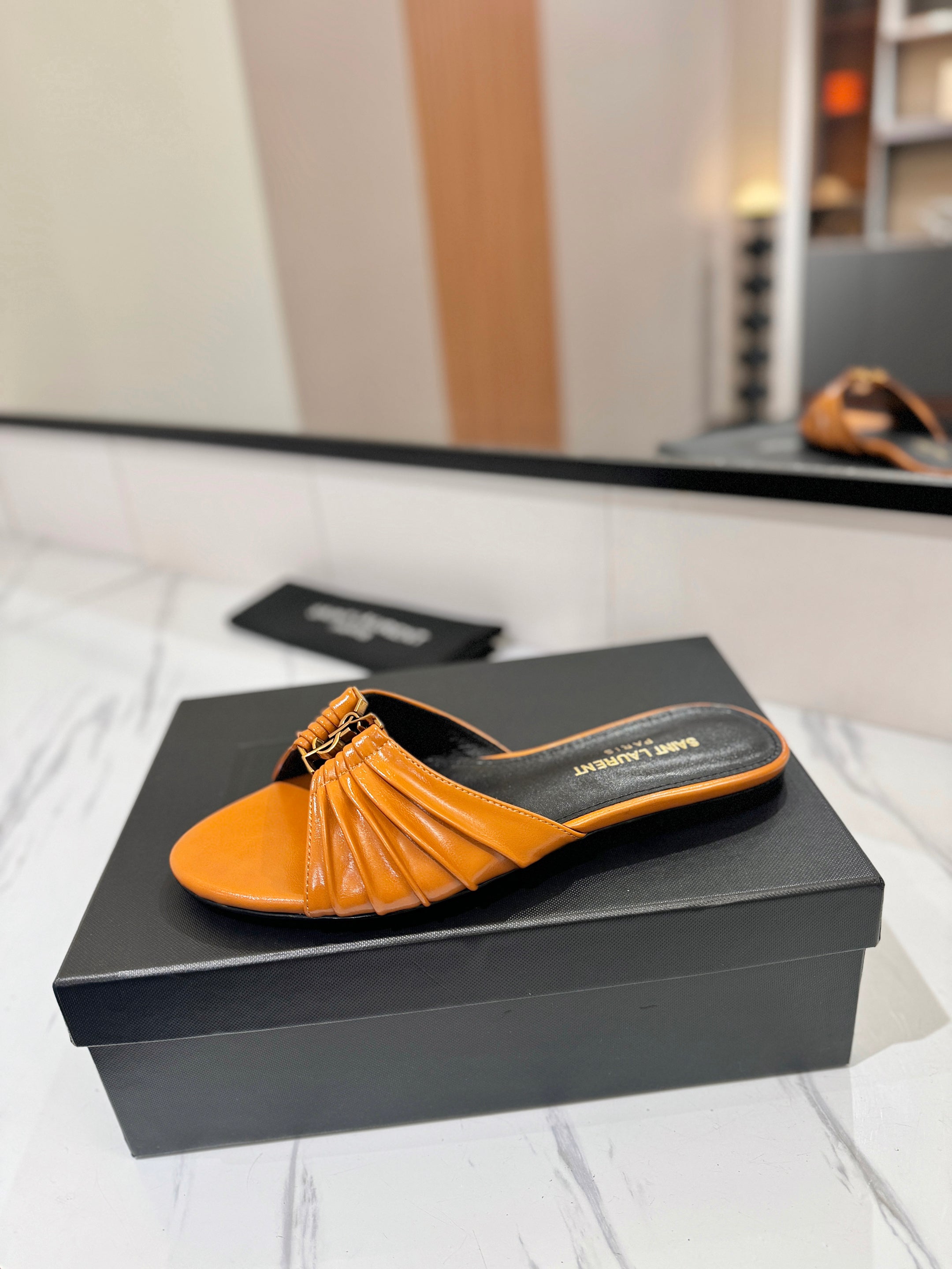 YSL 26S BABYLONE FLAT MULES IN DARK ORANGE LAMBSKIN