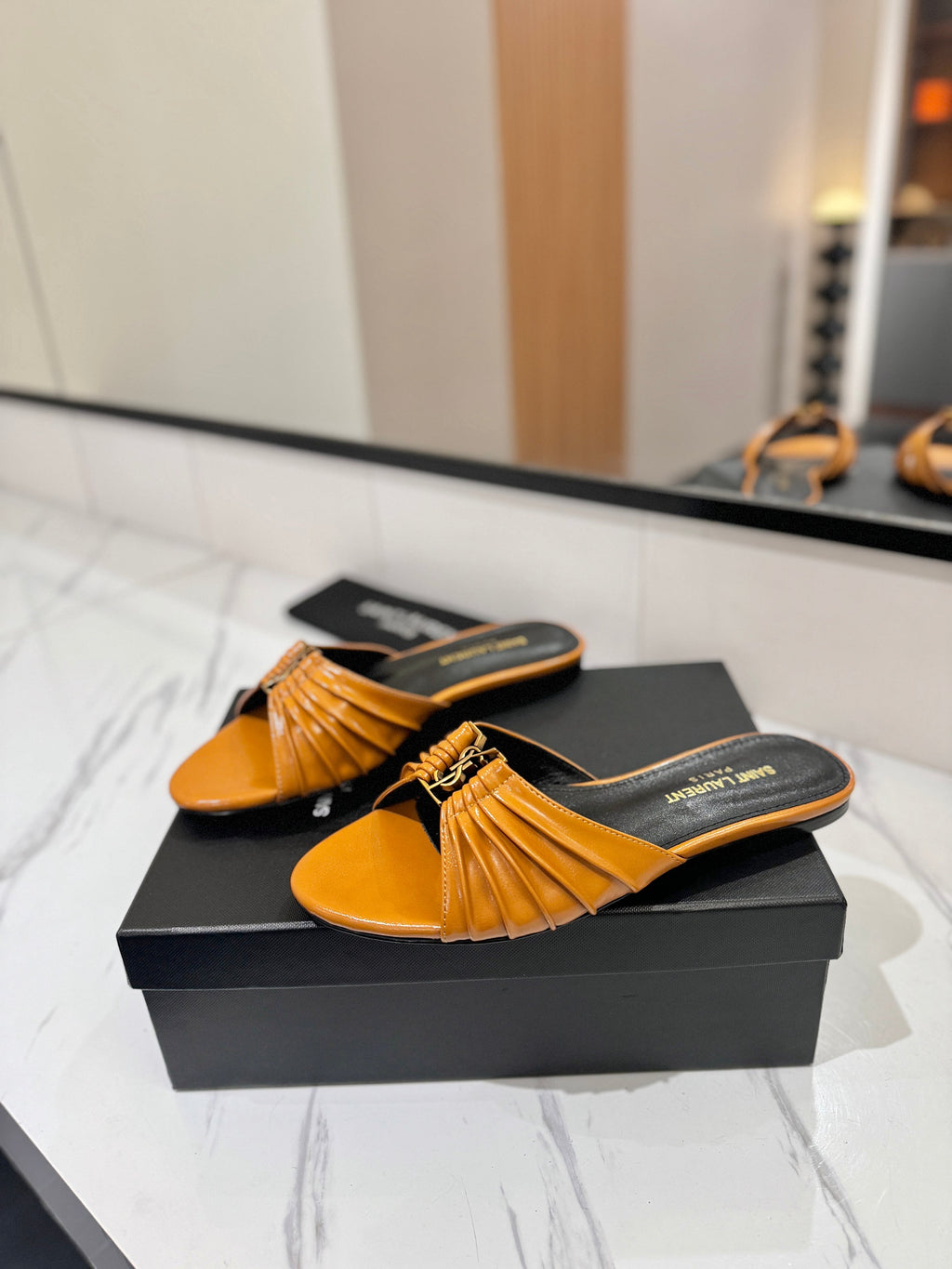 YSL 26S BABYLONE FLAT MULES IN DARK ORANGE LAMBSKIN