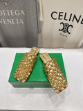BOTTEGA VENETA 26S WOVEN MULES IN GOLD LAMBSKIN