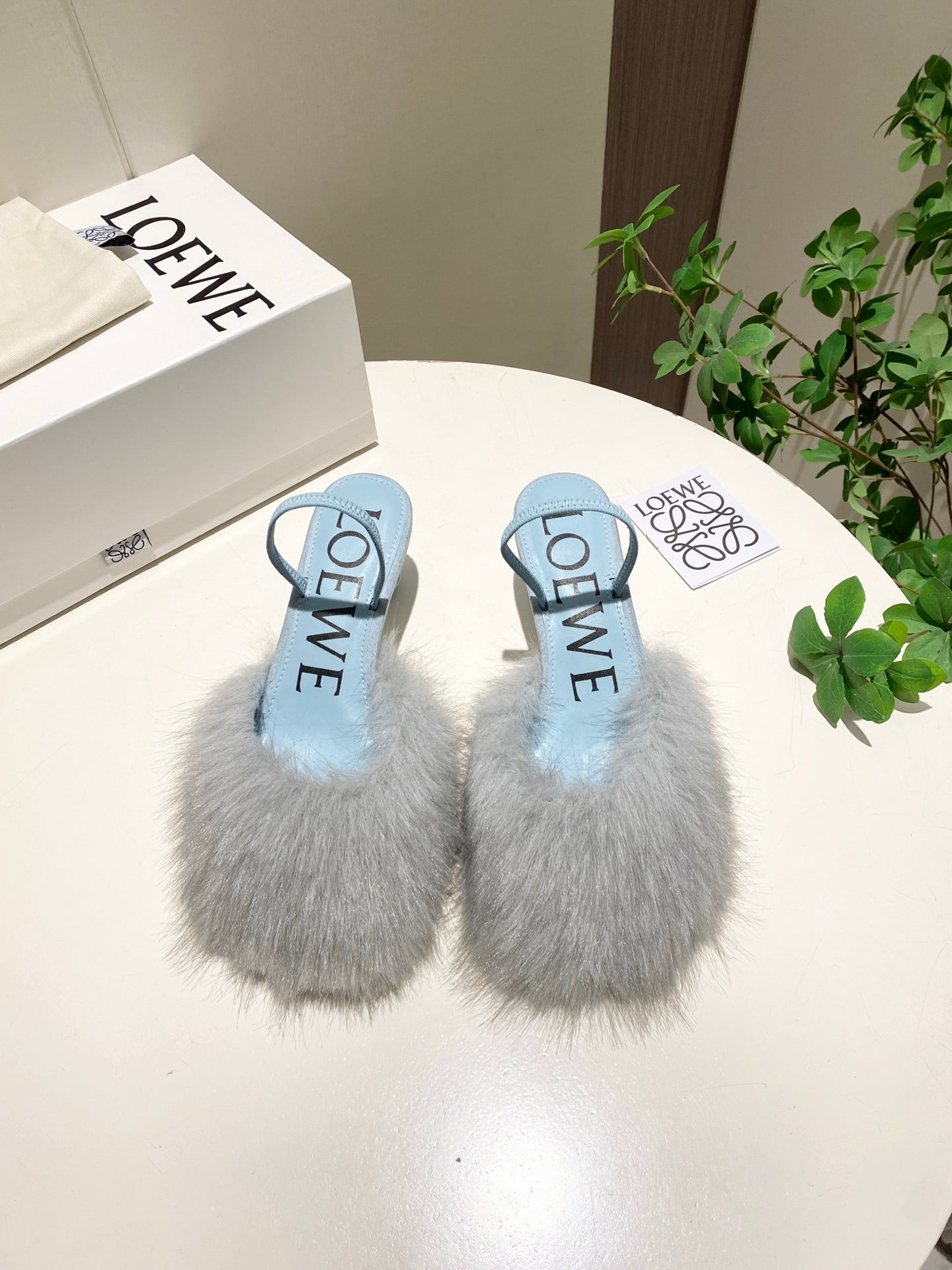 LOEWE 26S OPEN-BACK HIGH HEELS 60MM IN LIGHT BLUE CALFSKIN WITH FUR