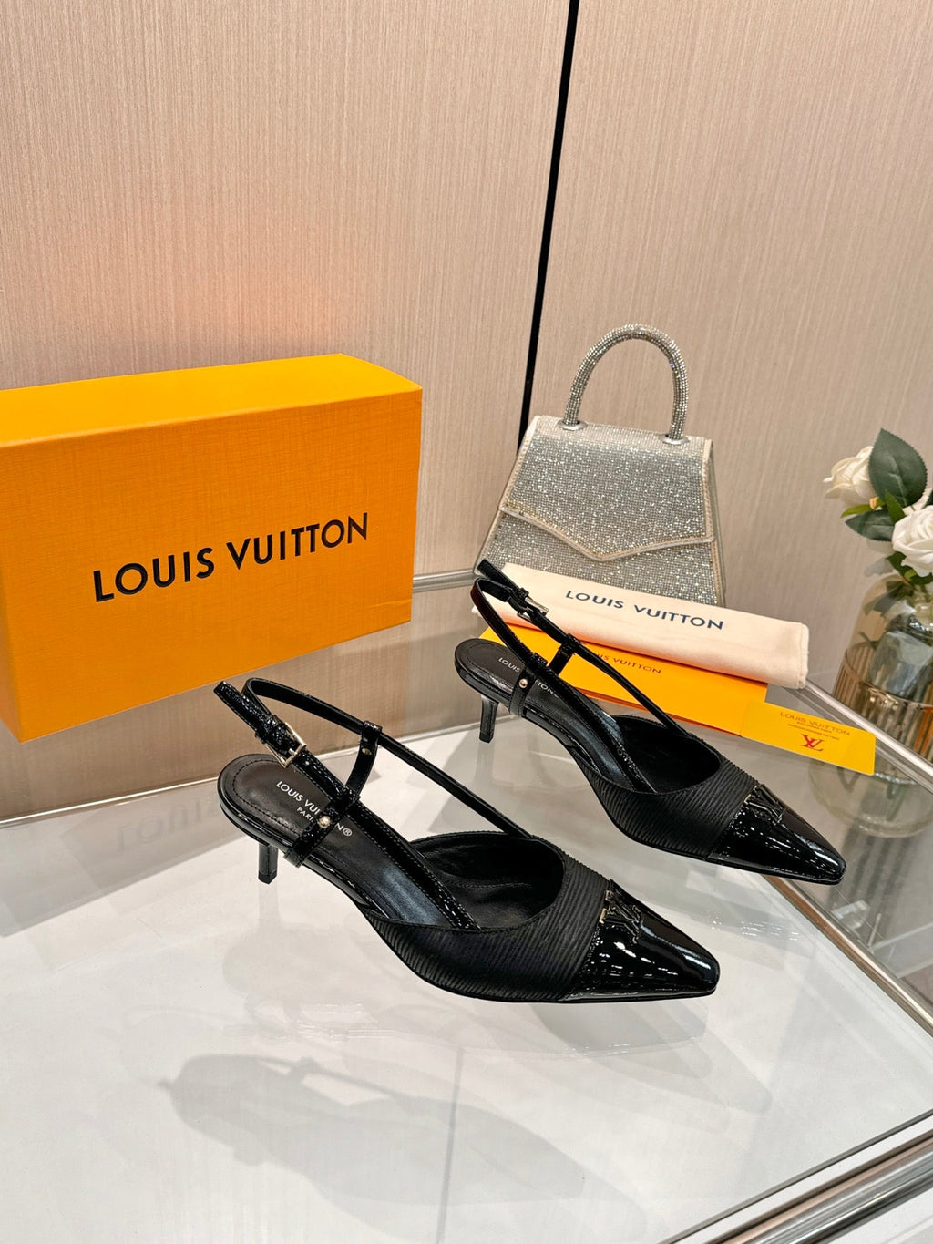 LV 26S SLINGBACK PUMPS 55 MM IN BLACK FABRIC AND CALFSKIN