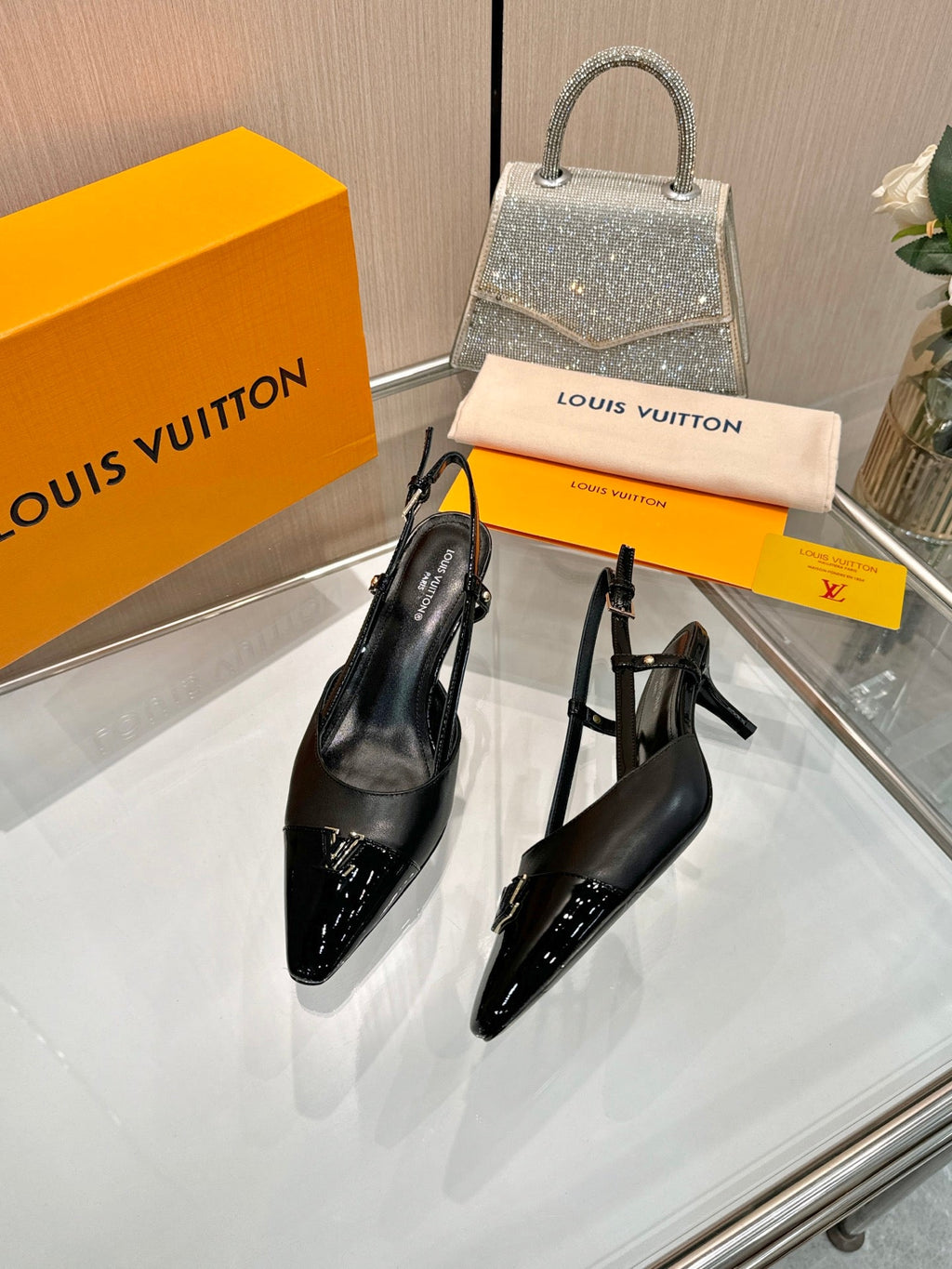 LV 26S SLINGBACK PUMPS 55 MM IN BLACK CALFSKIN