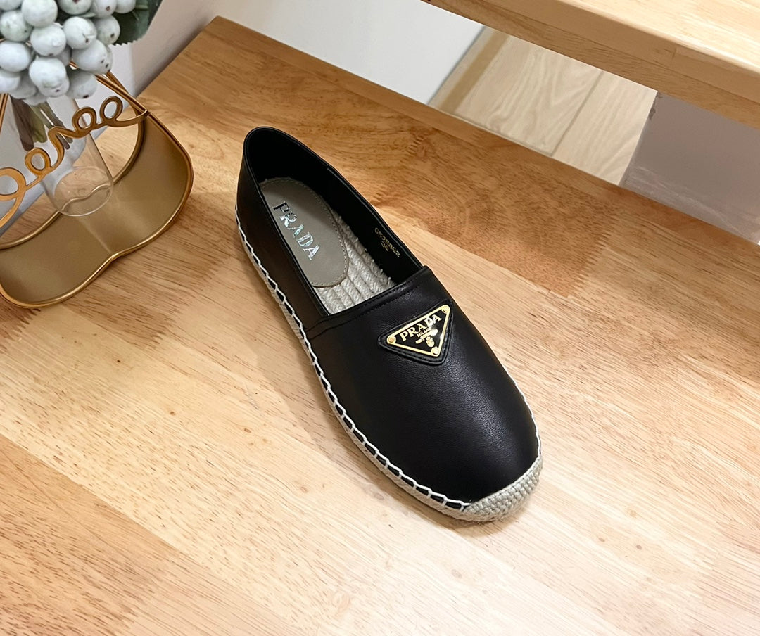 PRADA 26S LOGO ESPADRILLE SLIP ON FLATS IN BLACK CALFSKIN