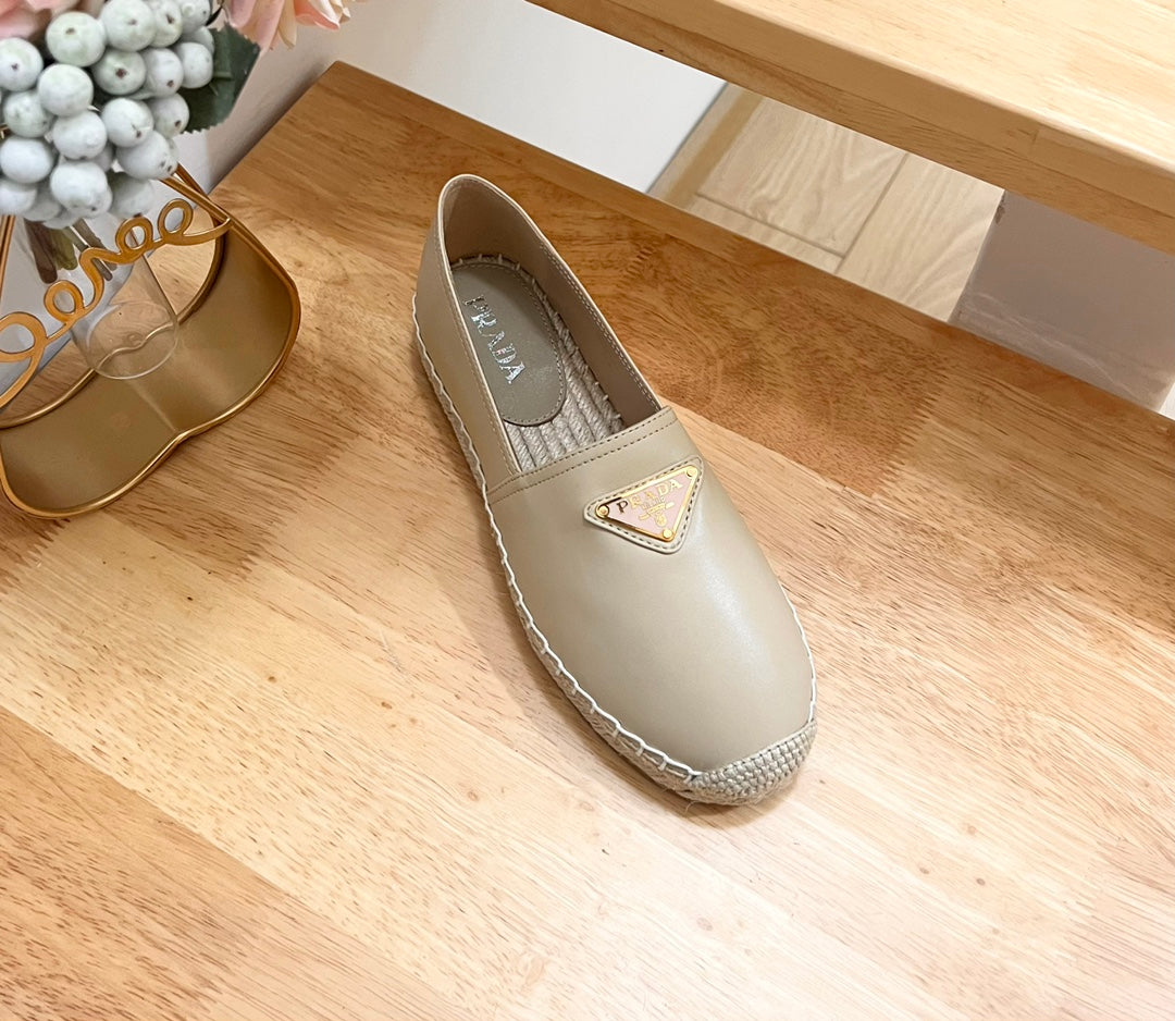 PRADA 26S LOGO ESPADRILLE SLIP ON FLATS IN DARK BEIGE CALFSKIN