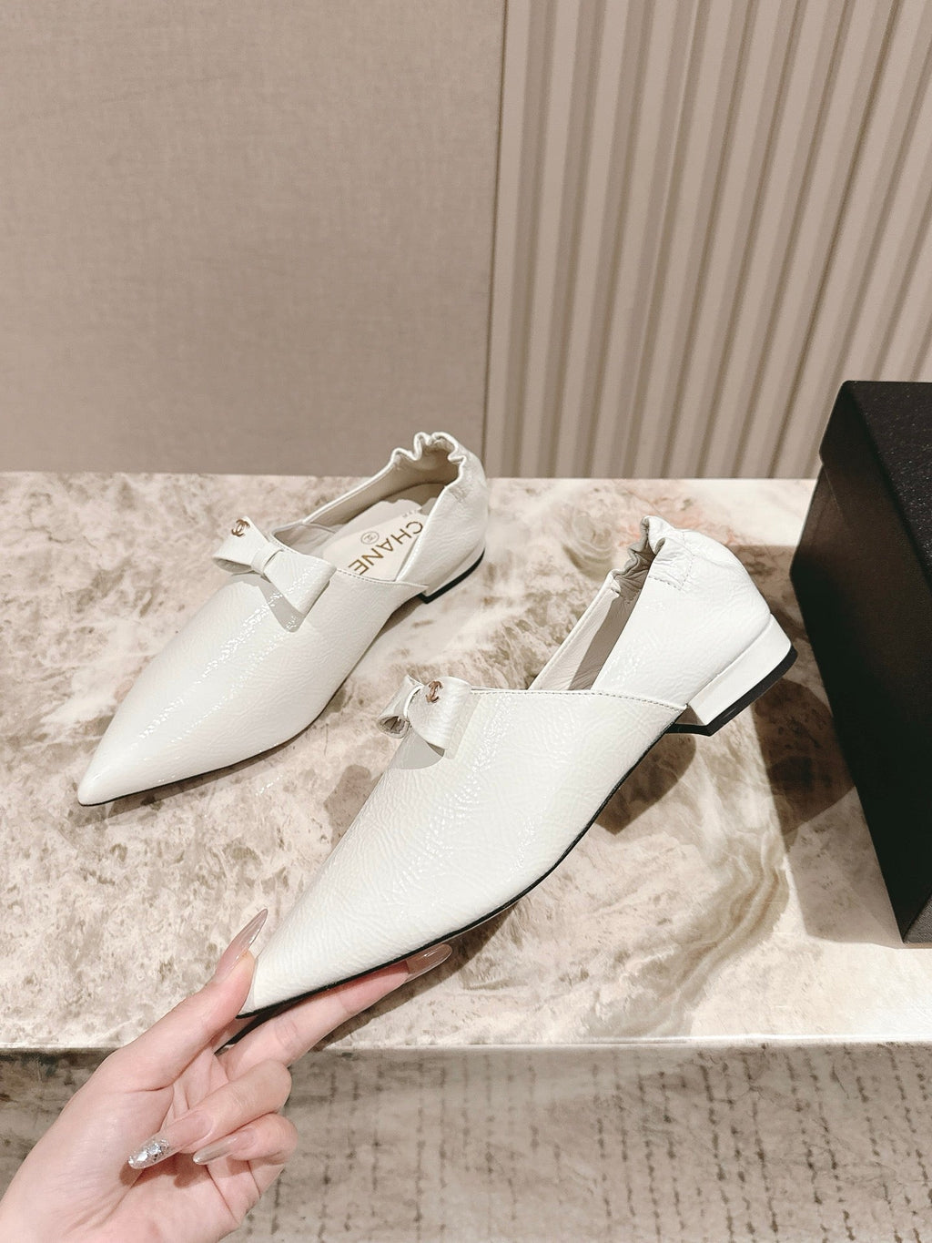 CC FLATS 25S IN WHITE PATENT LEATHER