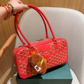 SAINT MARTIN BAG 35 IN CADMIUM RED GOYARDINE CANVAS AND CALFSKIN