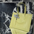 CELINE 25S FLAT CABAS NEW LUGGAGE 44MM IN PASTEL YELLOW GLOSSY CALFSKIN